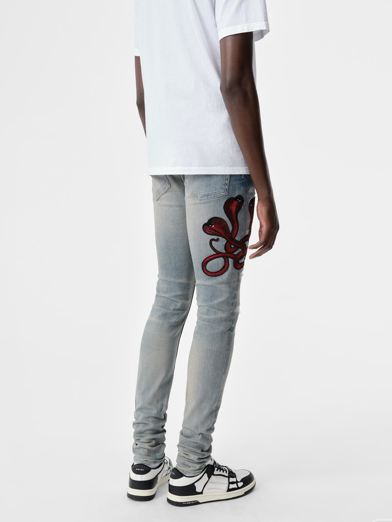 AMIRI RED POISON ARCHIVAL JEAN outlook