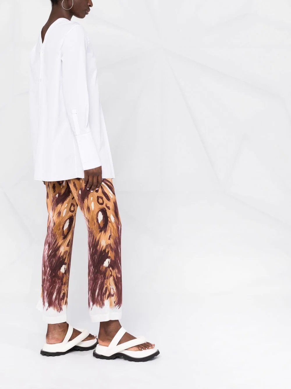 graphic-print flared trousers - 6