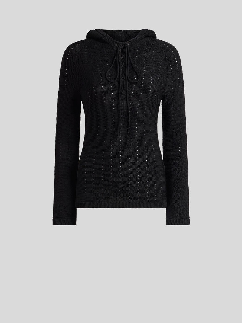 KNIT TOP WITH CROSSOVER AND PUNCHED DETAIL 1