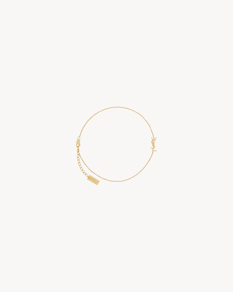 SAINT LAURENT CASSANDRE ANKLE BRACELET IN 18K YELLOW GOLD outlook