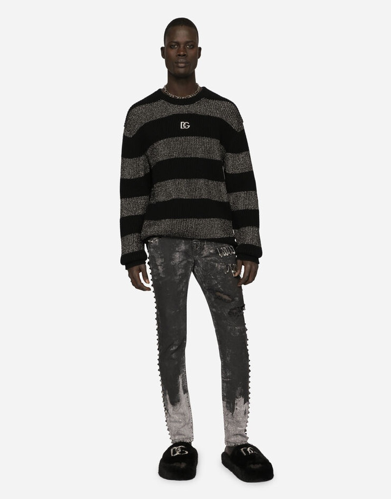 Skinny stretch jeans with studs and safety pins 1