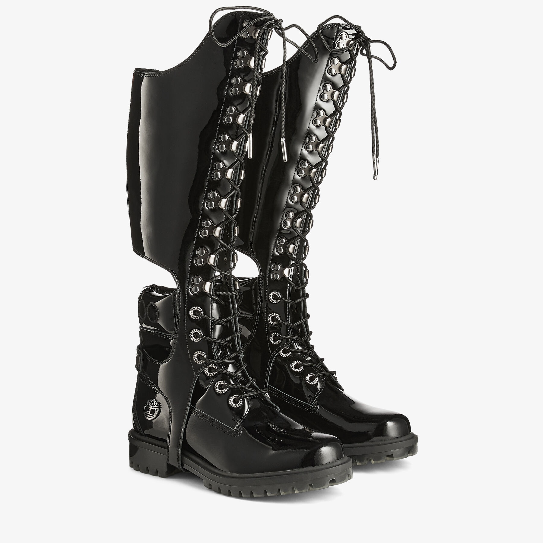 JIMMY CHOO X TIMBERLAND PATENT LEATHER HARNESS BOOT
Black Timberland Patent Knee High Boots with Det - 4