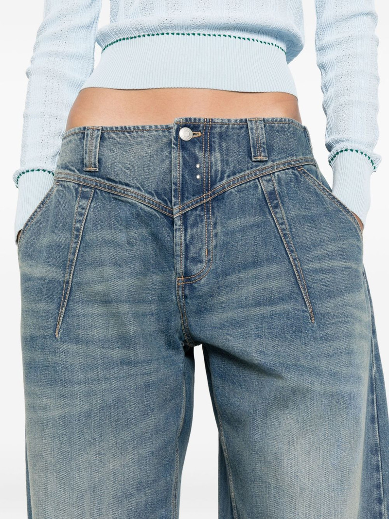 whiskering-effect jeans 5