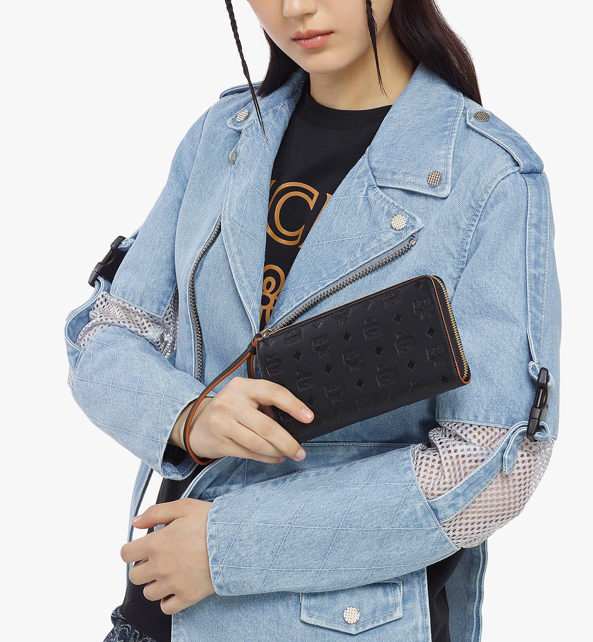 MCM Aren Zip Around Wallet in Embossed Monogram Leather | REVERSIBLE