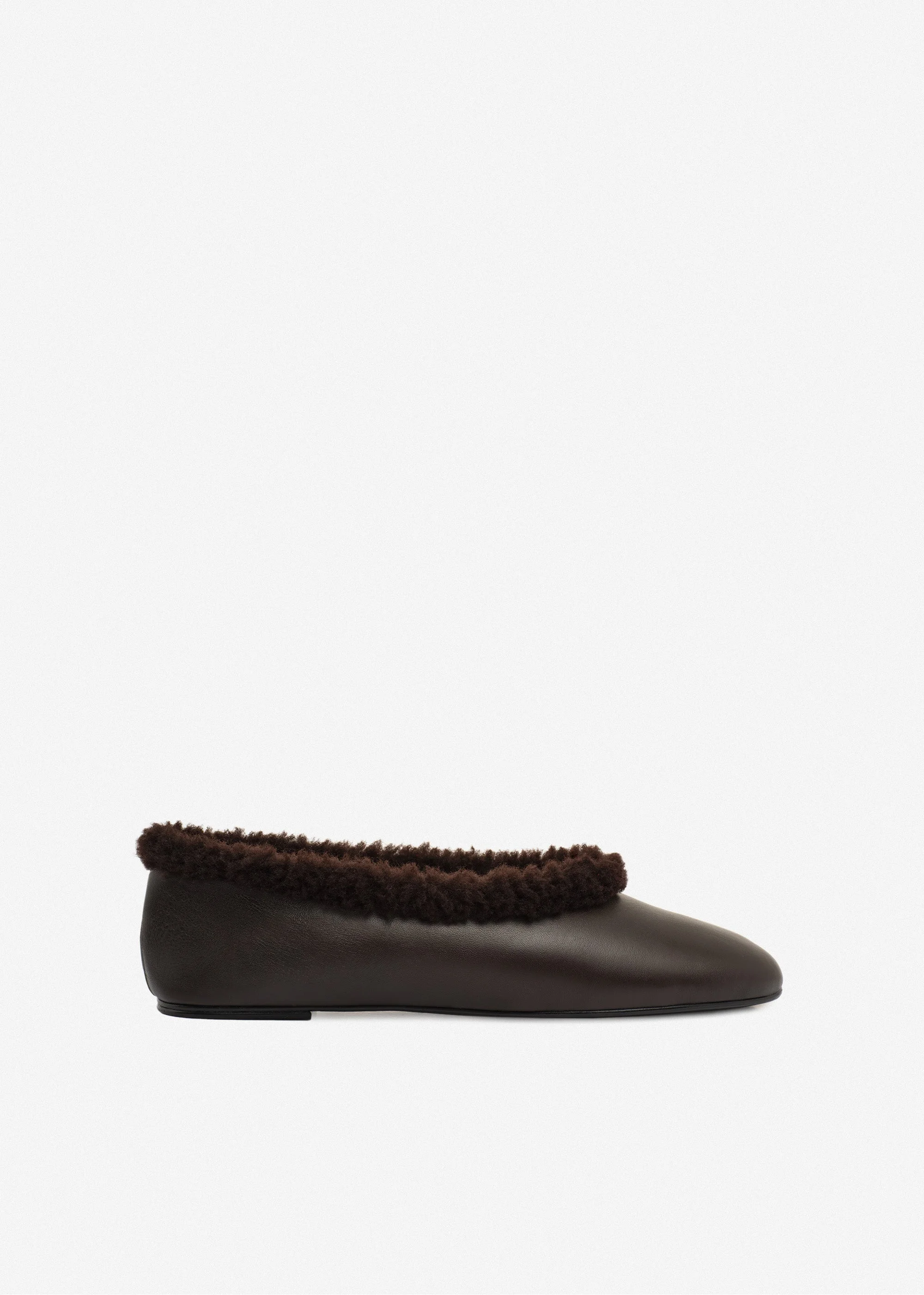 Leather ballet flats with shearling trim in brown - 1