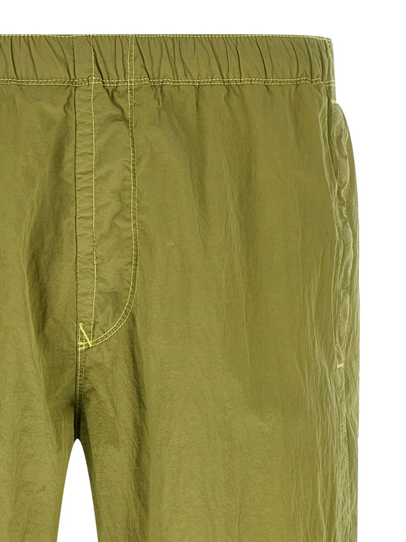 green track pants 3