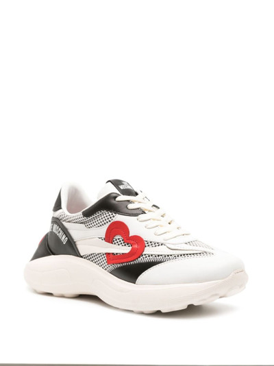 Moschino heart-patch lace-up sneakers outlook