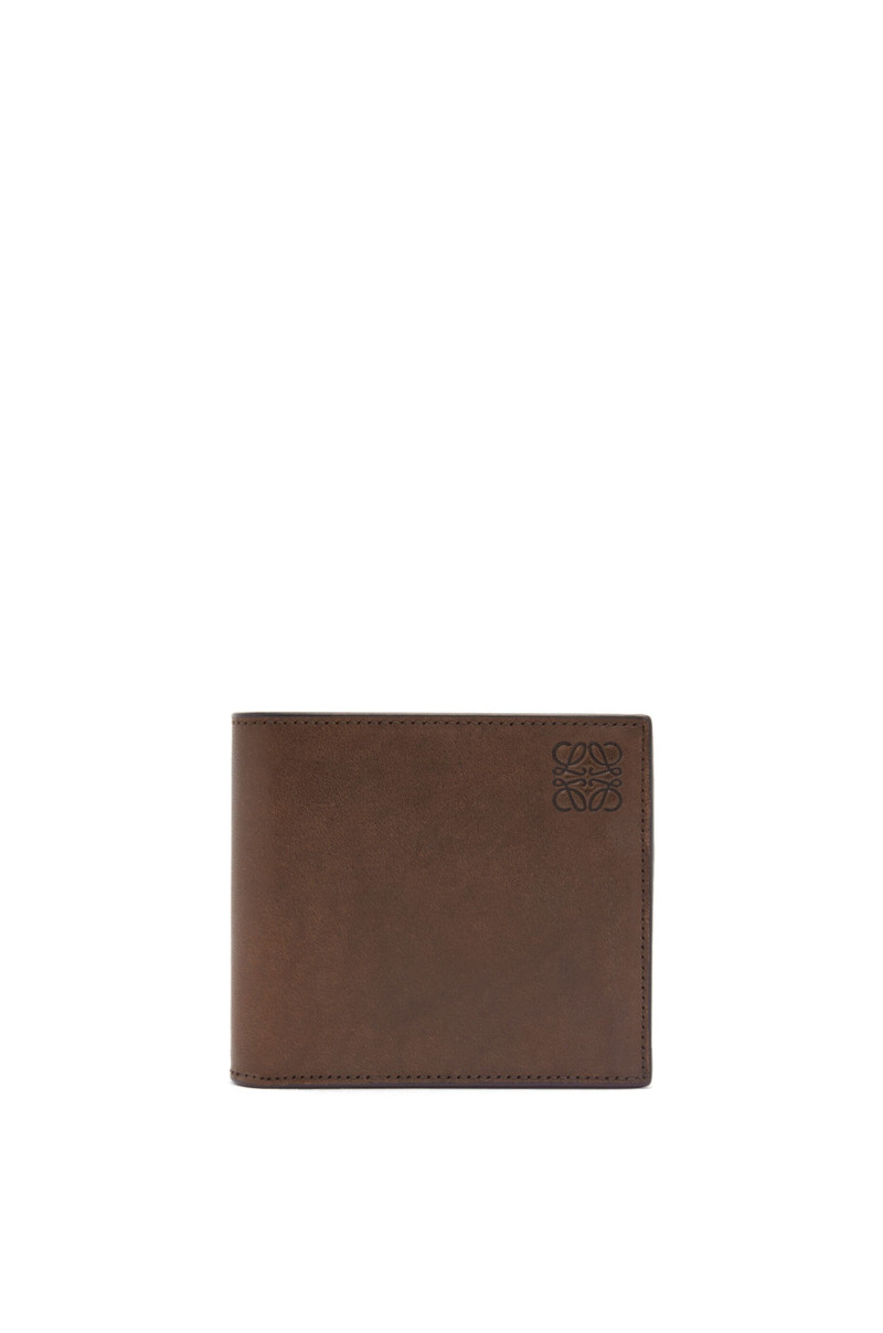 Bifold coin wallet in vegetable-tanned calfskin 1