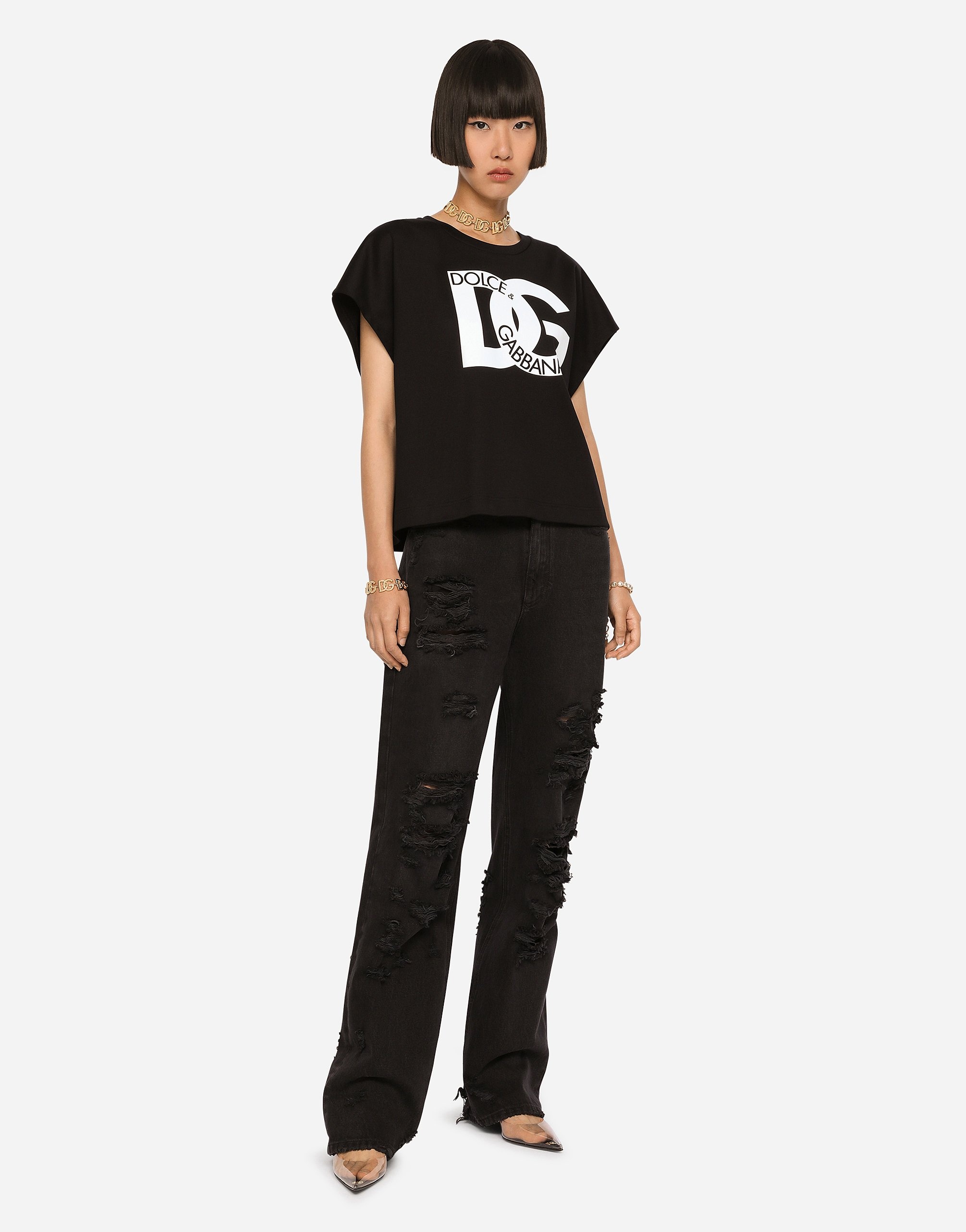 Flared jeans with ripped details - 2