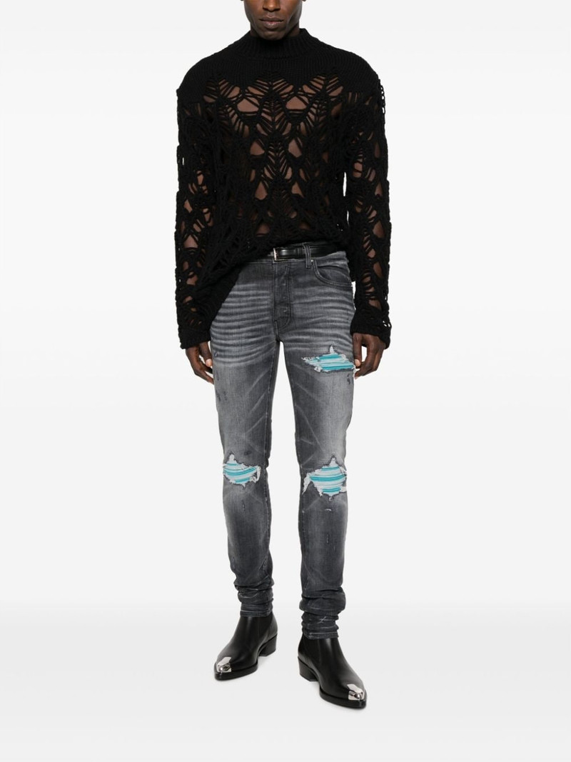 AMIRI distressed skinny jeans outlook