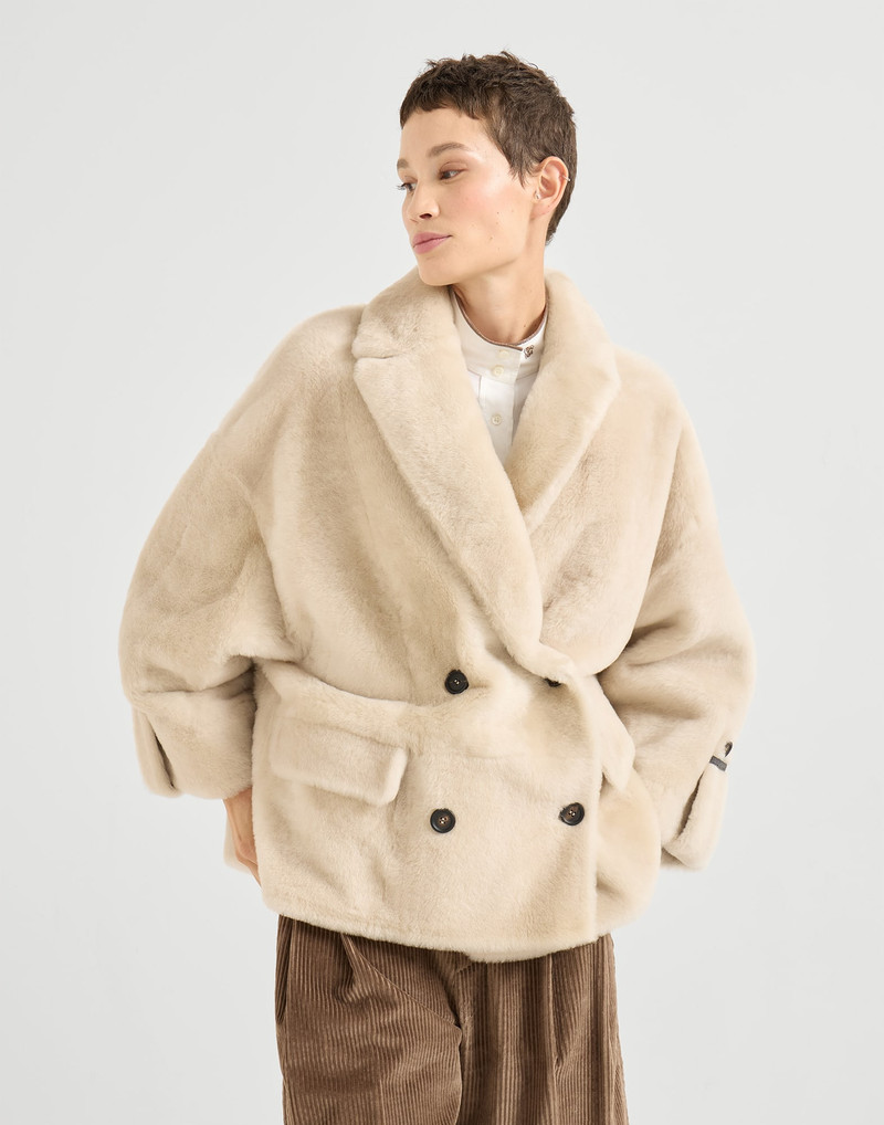Reversible shearling outerwear jacket with shiny cuff details 1
