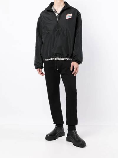 N°21 embossed logo tapered track trousers outlook