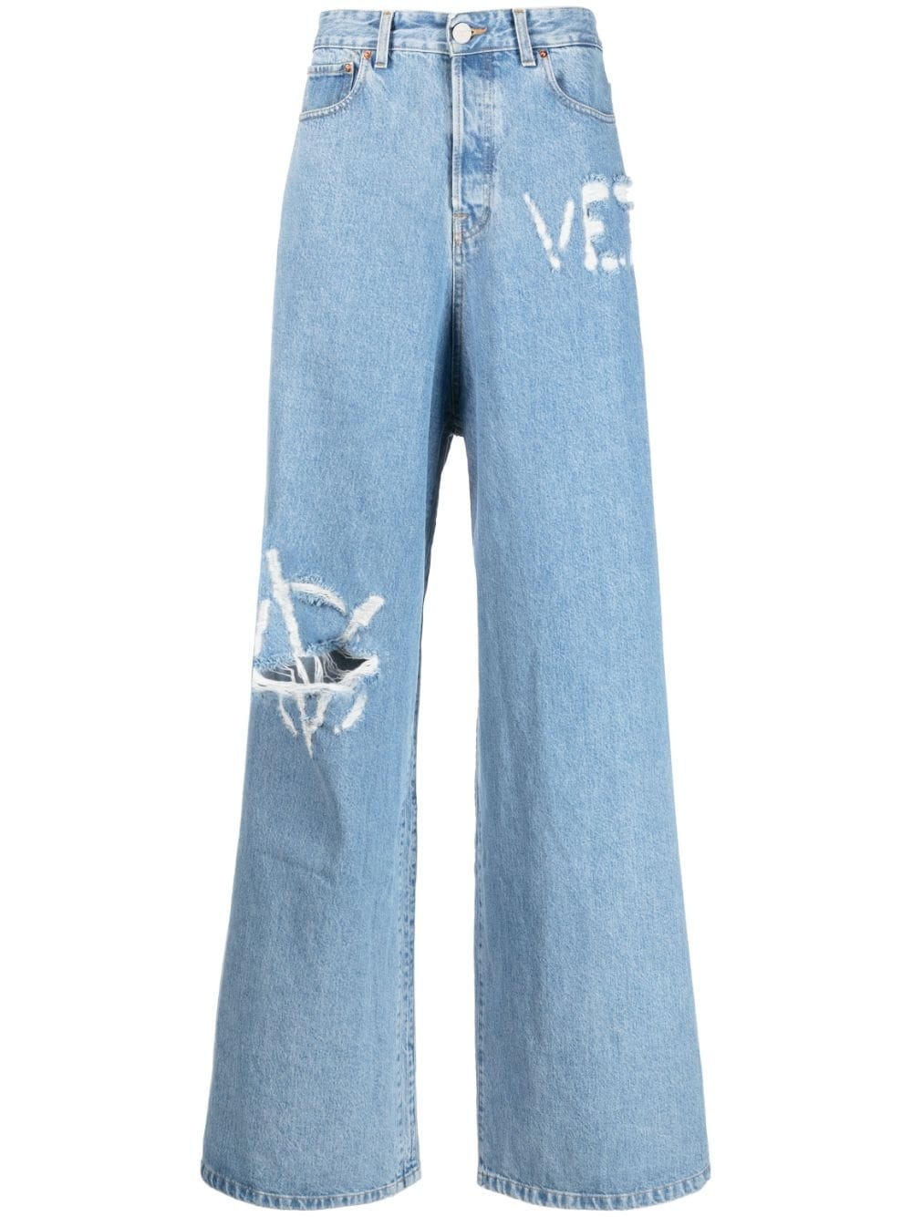 VETEMENTS logo-distressed baggy jeans | REVERSIBLE