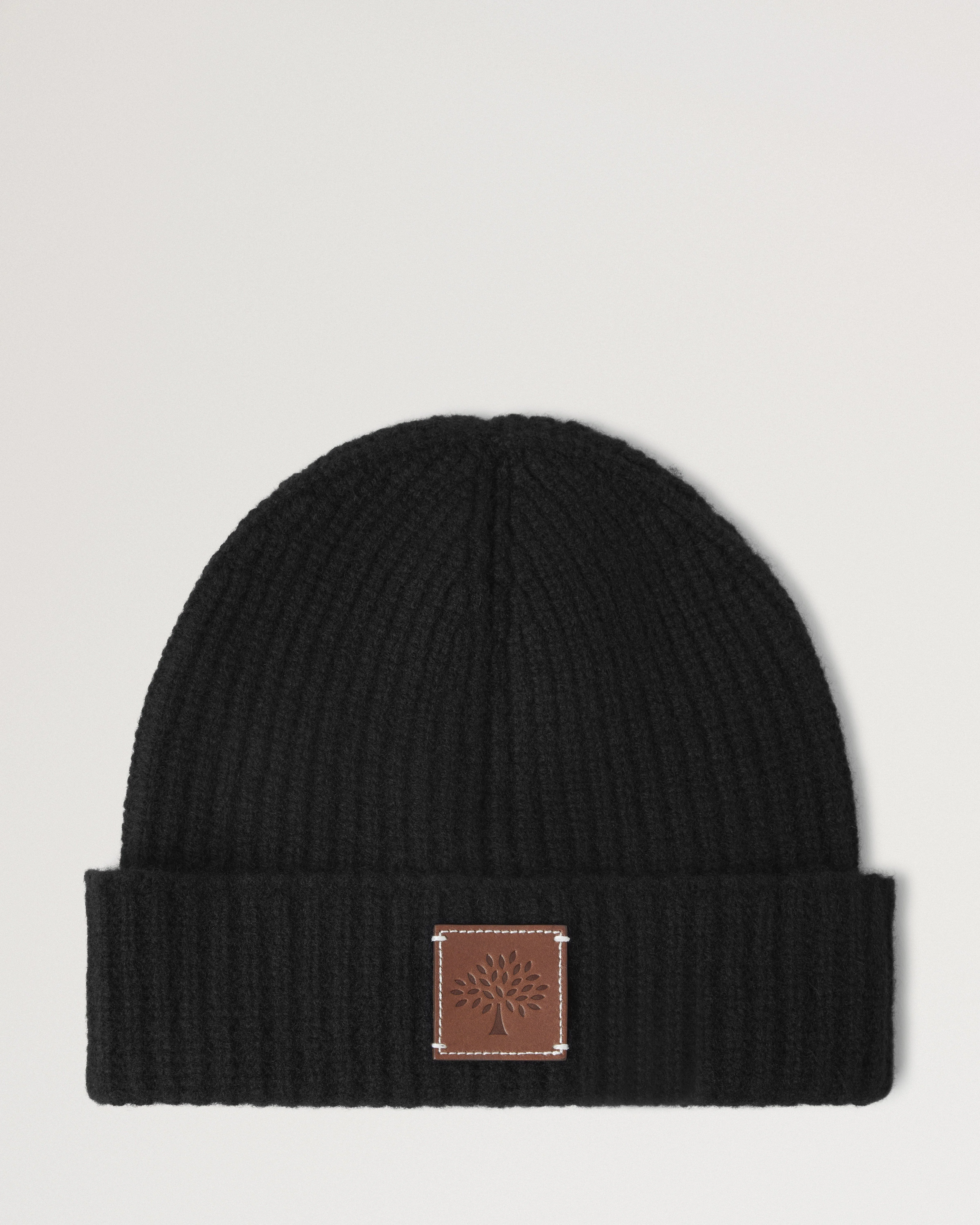 Solid Textured Beanie
Black Lambswool - 1