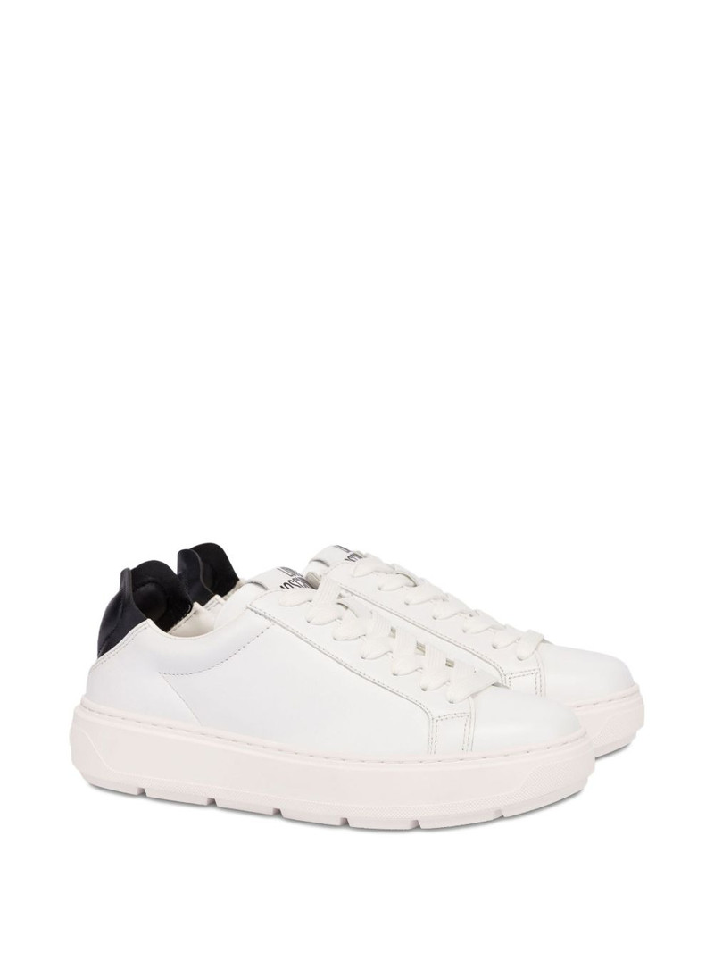 Moschino logo-embossed sneakers outlook