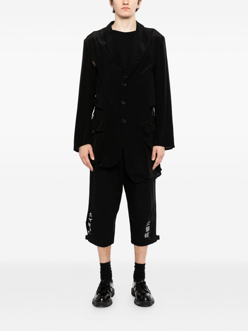 Yohji Yamamoto asymmetric hem jacket outlook