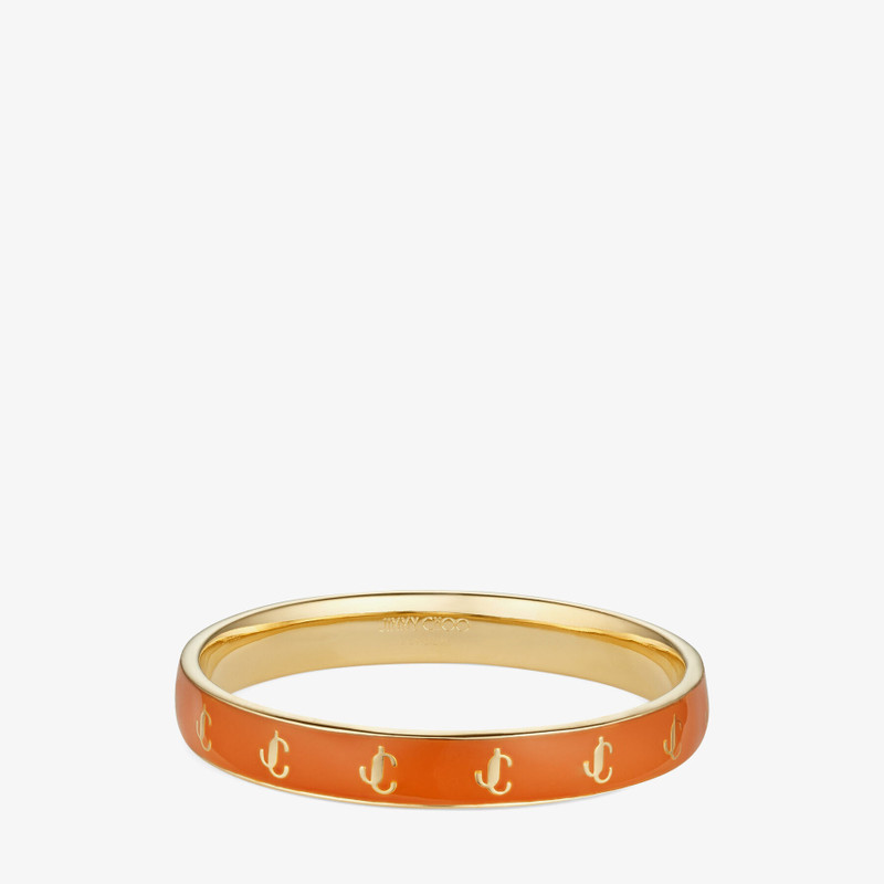 JC Enamel Bangle
Gold-Finish Metal and Amber Orange Enamel JC Bangle 1
