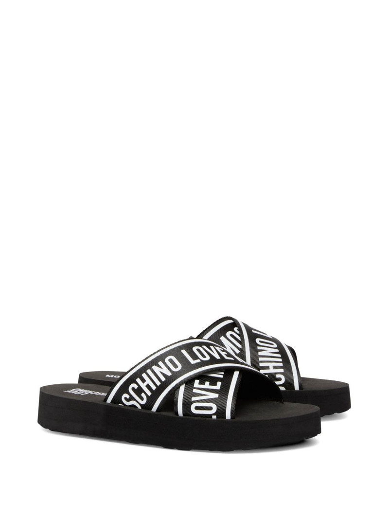 Moschino logo slide outlook