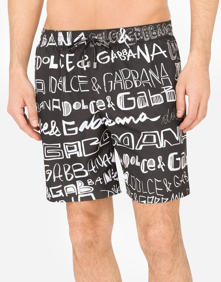 Mid-length swim trunks with all-over Dolce&Gabbana print - 4