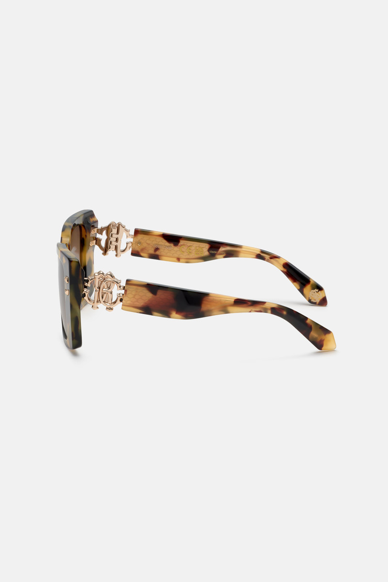 Sunglasses with wide rectangular front and fangs 4