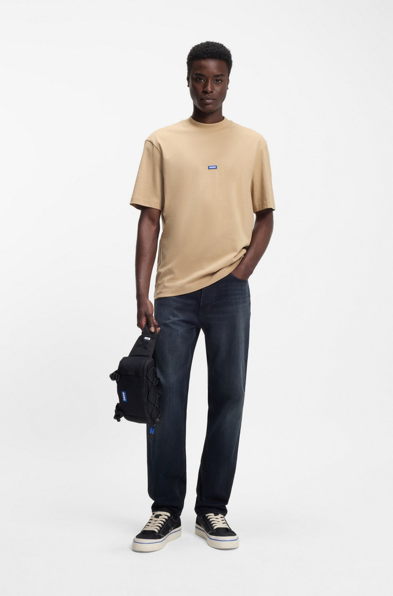 HUGO DARK-BLUE REGULAR-FIT JEANS IN STONEWASHED DENIM outlook