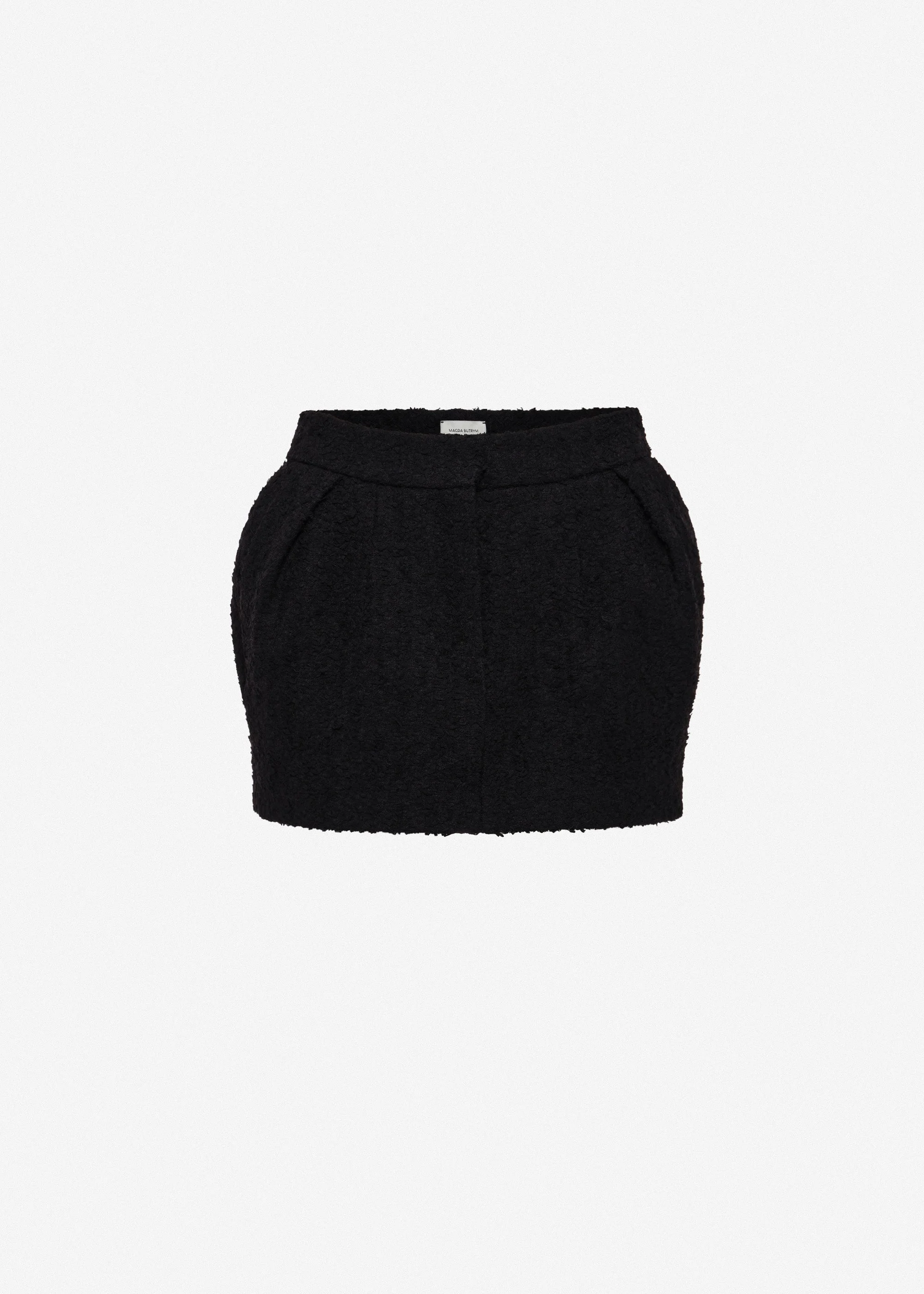 Tailored bouclé mini skirt in black - 1