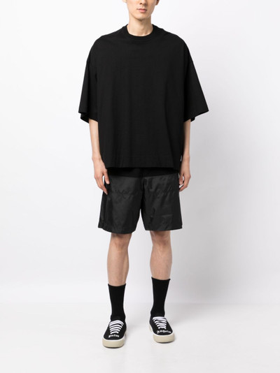 UNDERCOVER panelled-design elasticated-waistband track shorts outlook