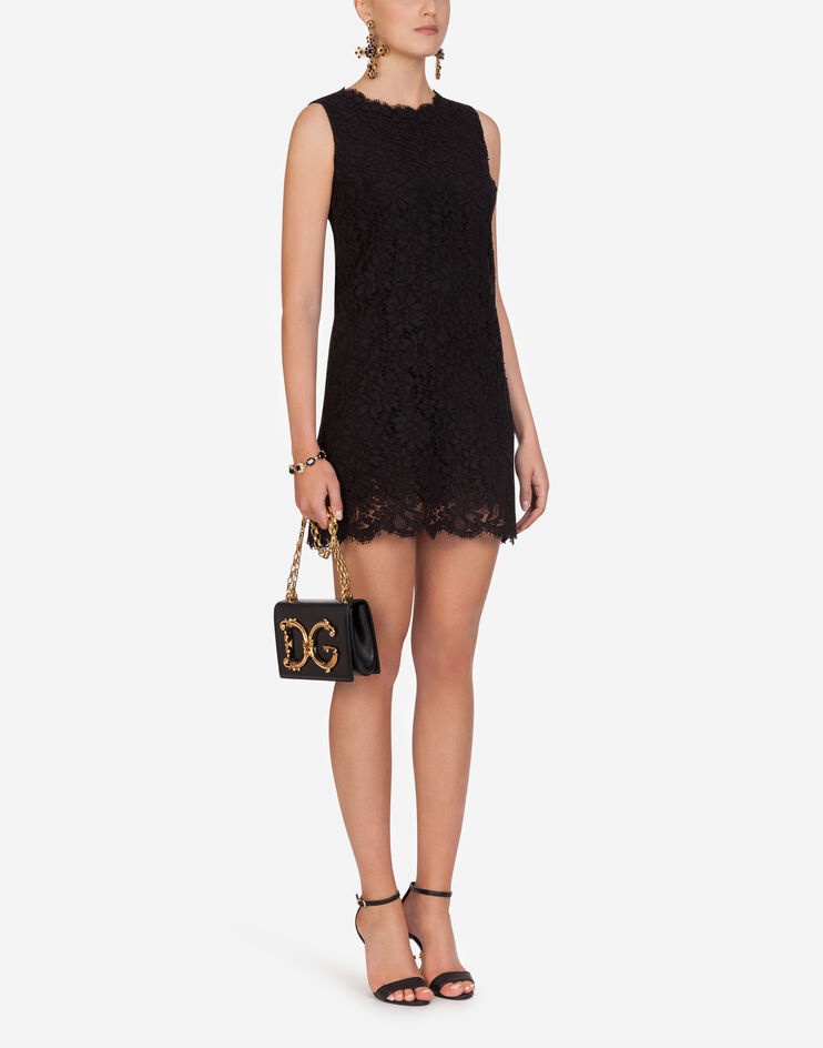 Short sleeveless lace dress - 1