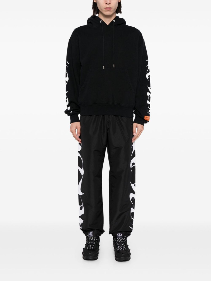 Heron Preston graphic-print track pants outlook