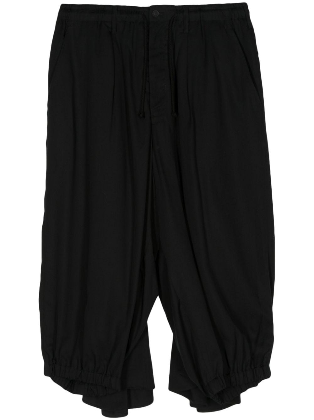 drawstring-waist crow trousers - 1