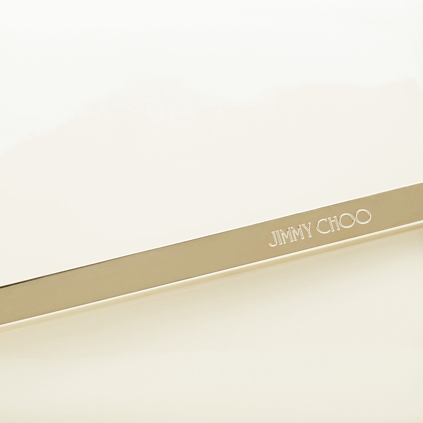 Emmie
Latte Patent Leather Clutch Bag - 3