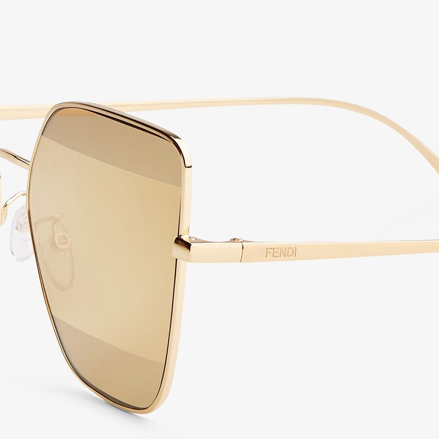 Sunglasses with gold-mirrored lenses - 3