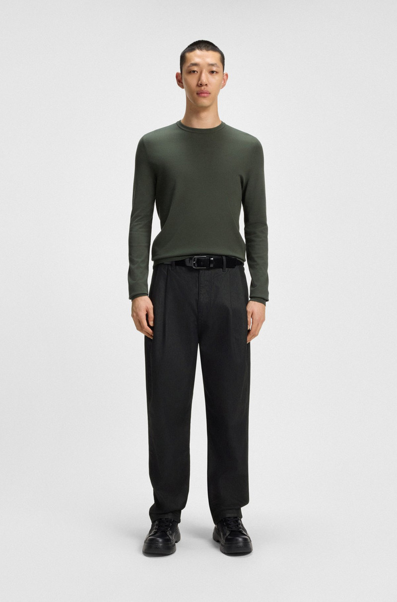 HUGO RELAXED-FIT JEANS IN BLACK WAXED DENIM outlook