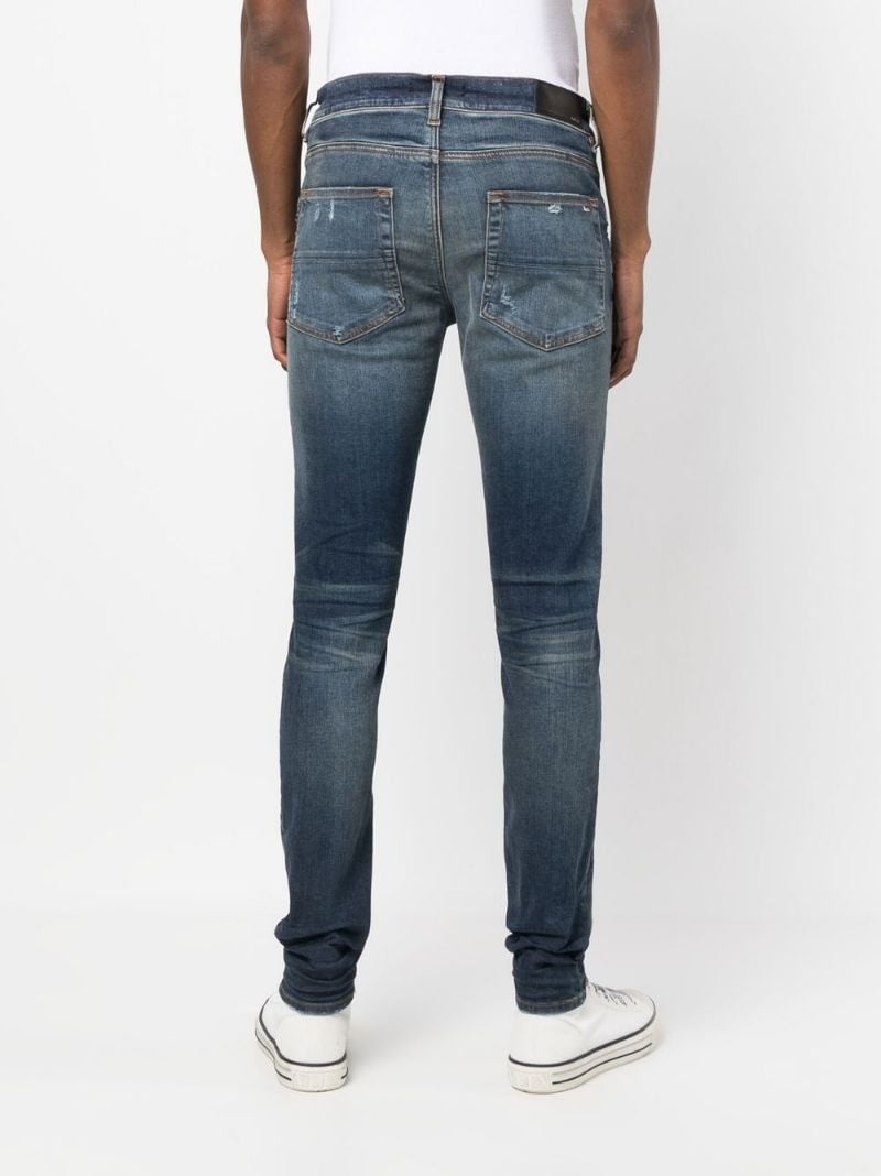 distressed-effect skinny jeans - 4