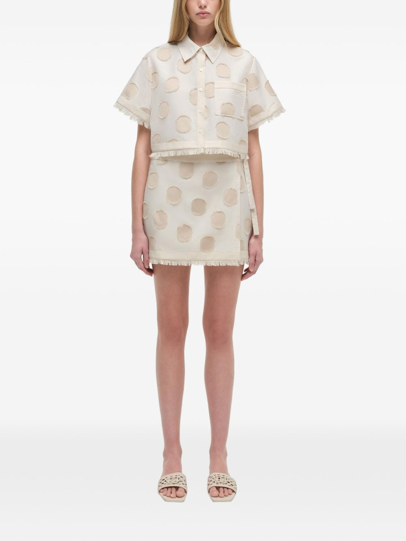 SIMKHAI Bethany polka-dot fringed mini skirt outlook