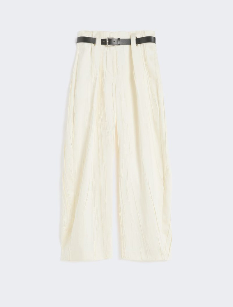 Low-waisted wide trousers in satin - ivory 1