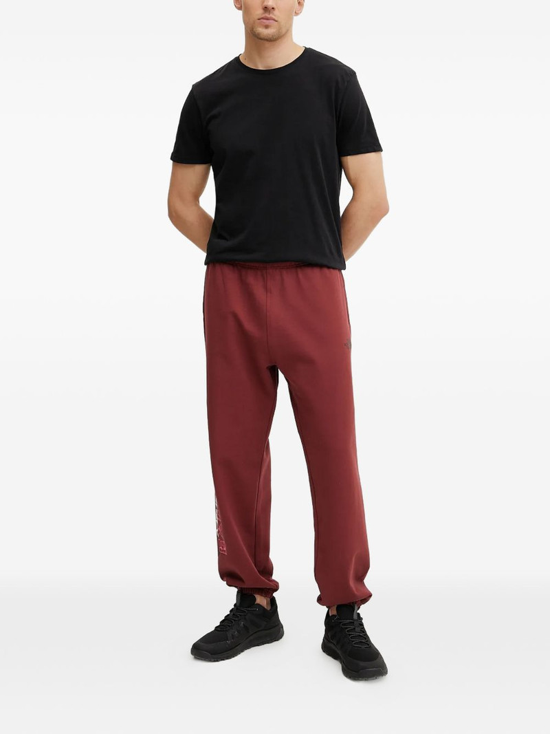 The North Face logo print trousers outlook