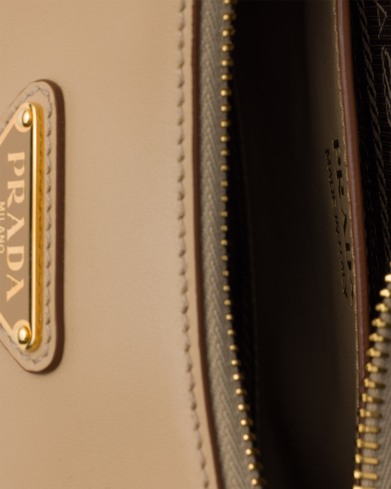 Prada Arqué mini leather shoulder bag 4