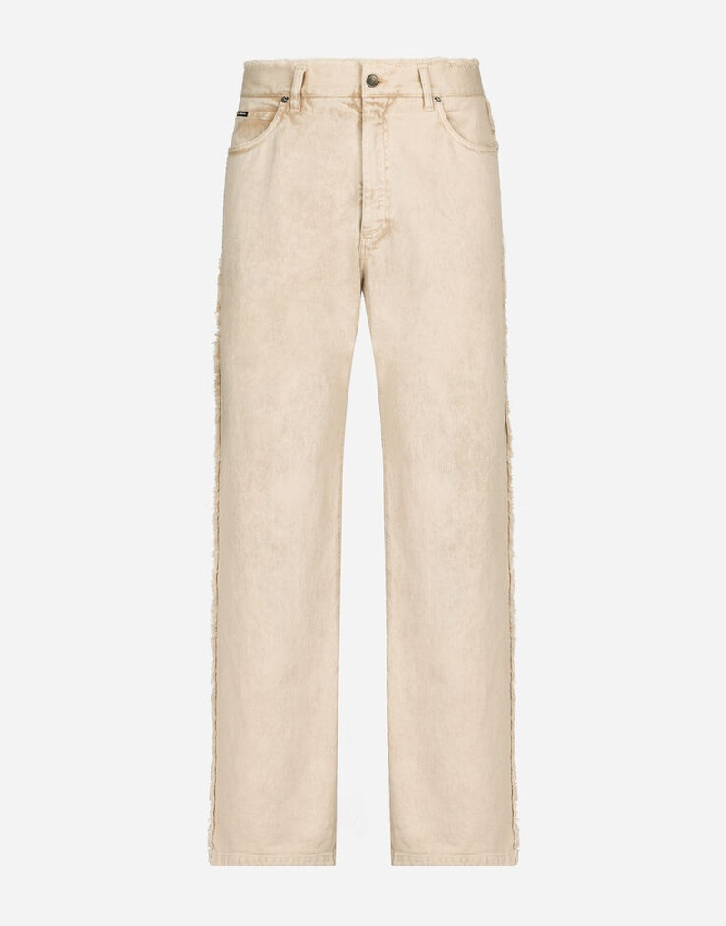 Overdyed jeans with raw hem details 1