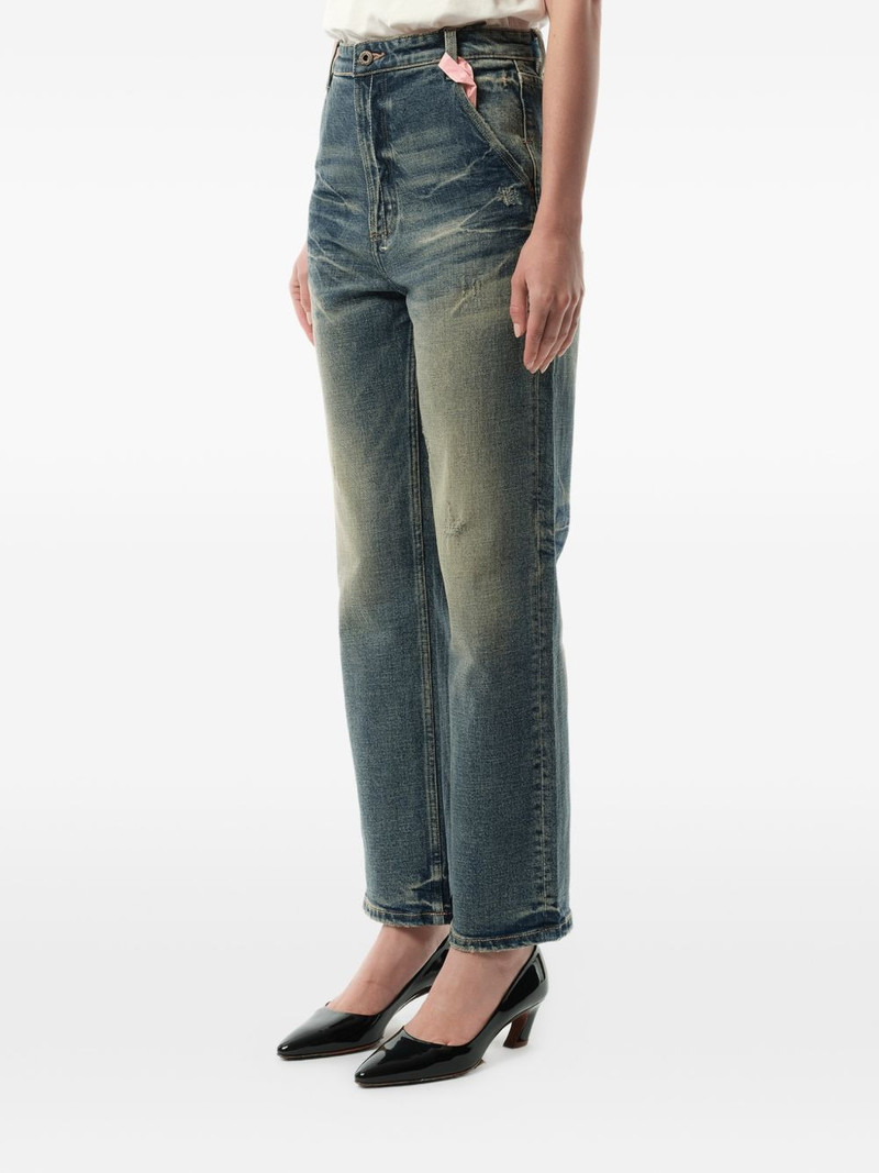 whiskering-effect jeans 4