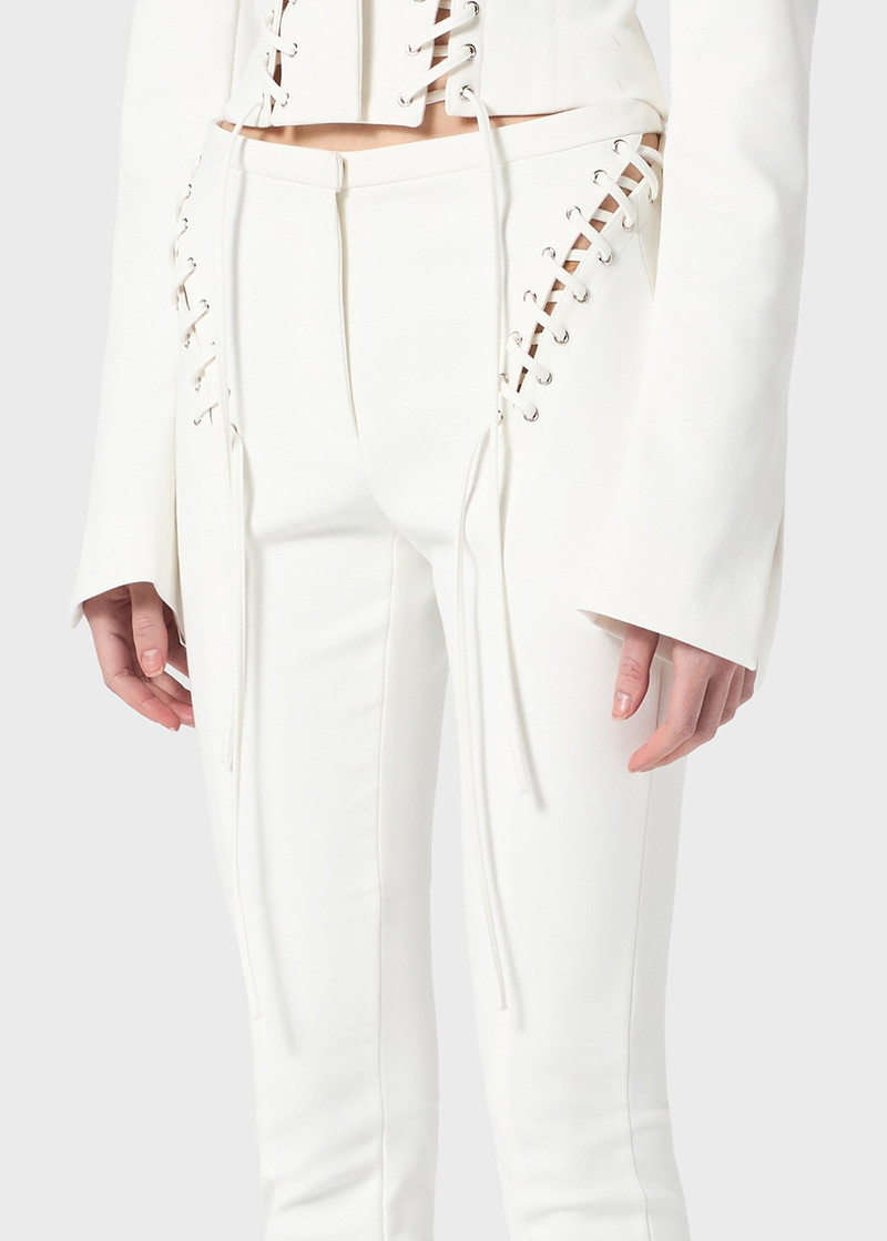 STRETCH COTTON PANTS WITH EYELETS AND STRAPS 5