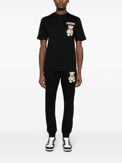 Moschino Teddy Bear-print tapered track pants outlook