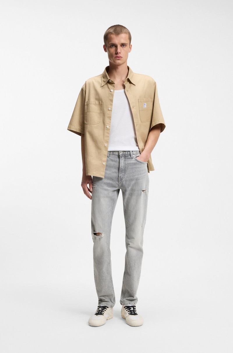 HUGO SLIM-FIT JEANS IN DISTRESSED GRAY DENIM outlook