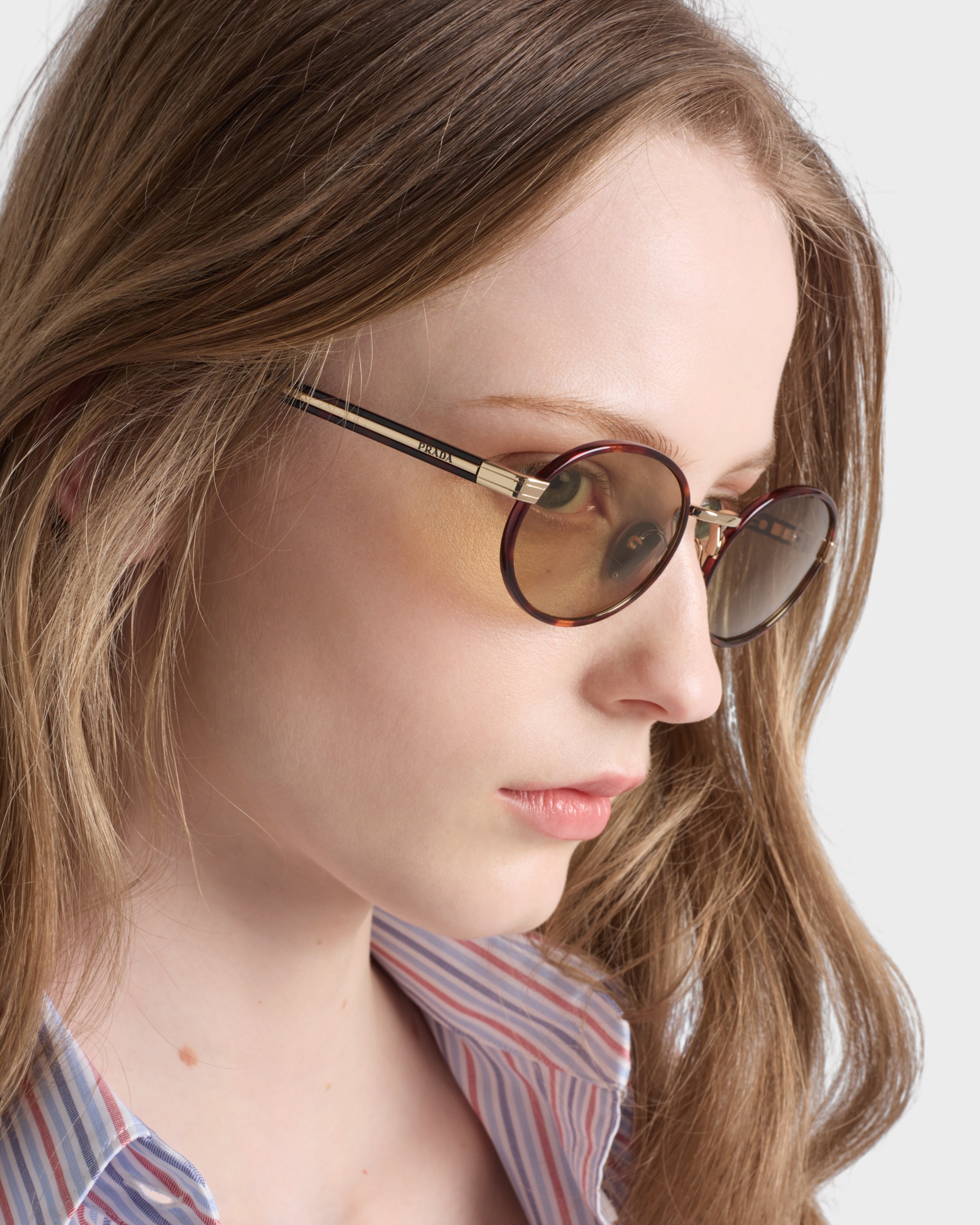 Prada Prada sunglasses with the iconic metal plaque | REVERSIBLE