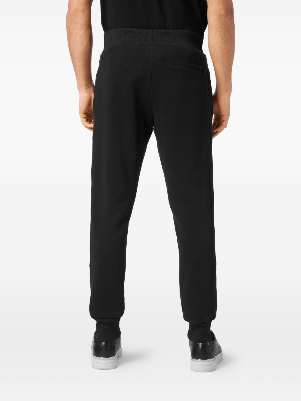 skull-studded track pants - 4