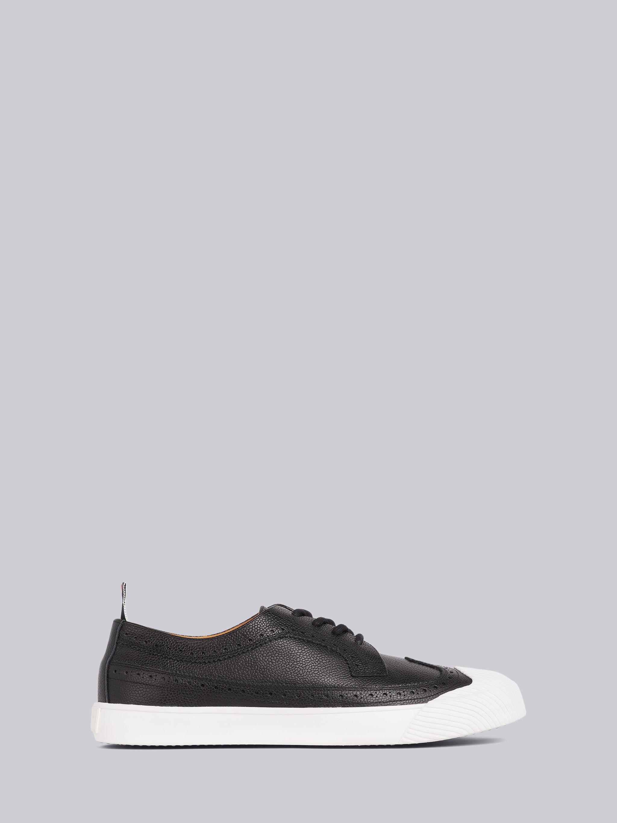 Black Pebbled Calfskin Longwing Brogue Trainer - 1