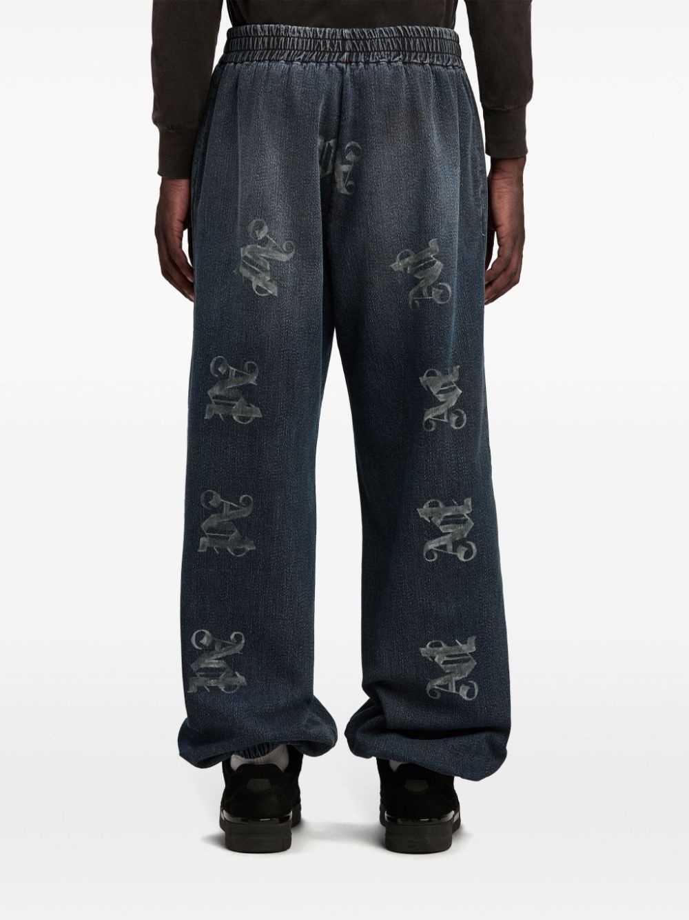 monogram-print elasticated jeans - 5