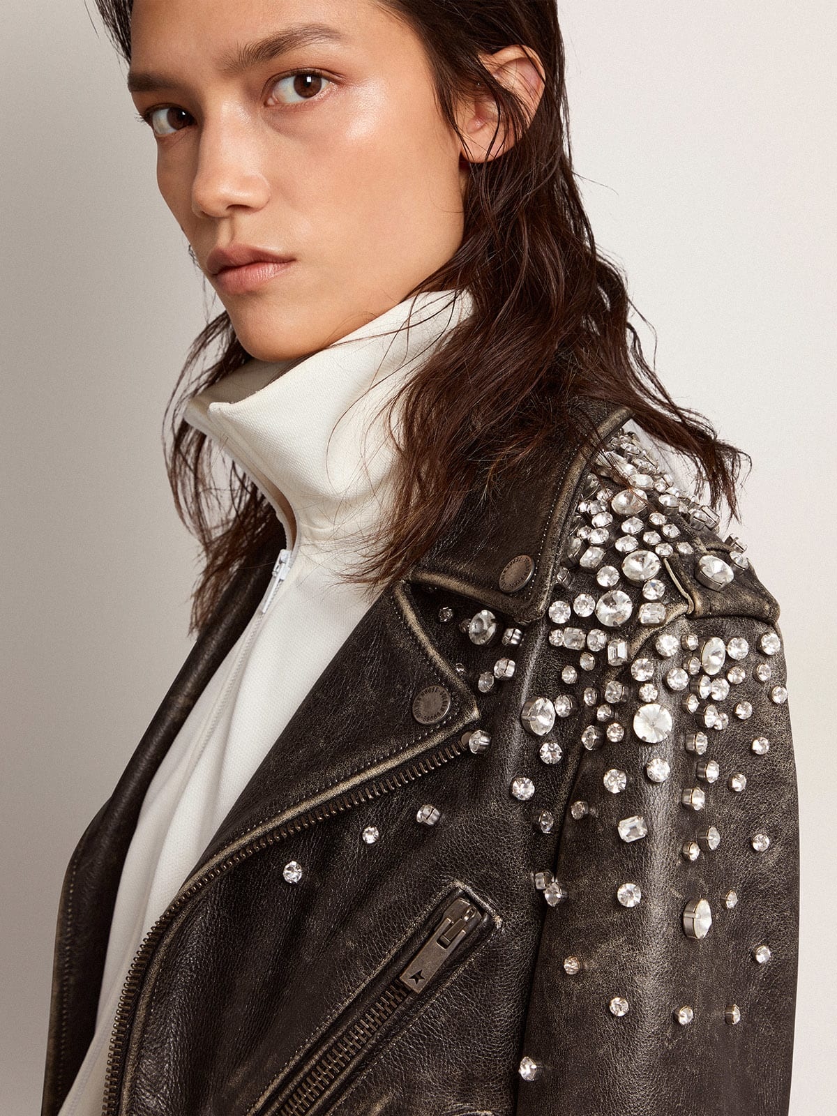 Women's biker jacket in distressed leather with cabochon crystals - 5