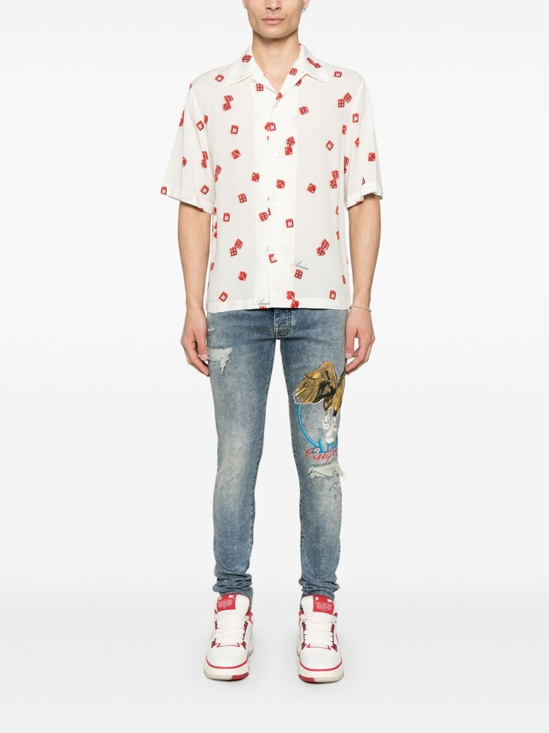AMIRI pegasus-print jeans outlook