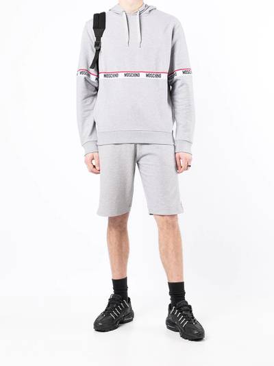 Moschino logo-tape drawstring hoodie outlook